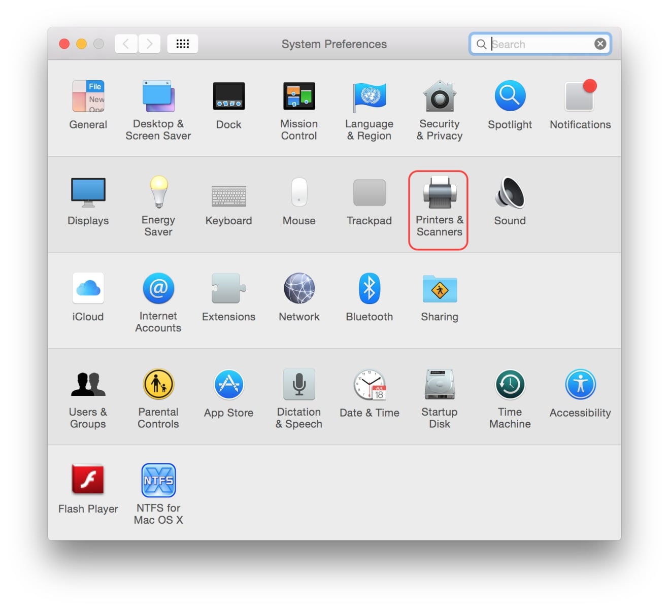 Vào System Preferences -> chọn Printers and Scanner